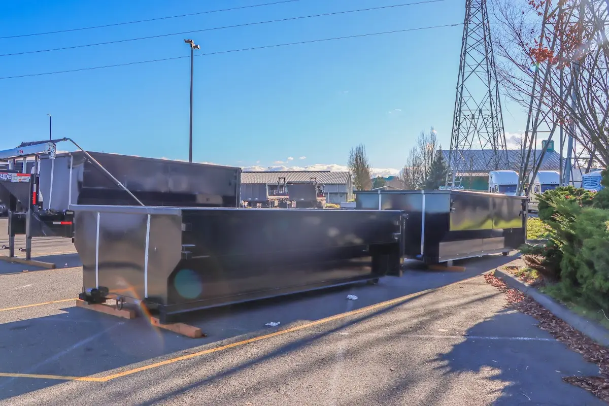 Roll-off dumpster ready for waste disposal at job site for Commercial Dumpster Rental in Grand Ledge